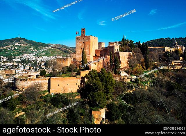 Aerial beautiful drone point of view Granada castle surrounding lands and cityscape, Alhambra or Red Castle, located on top of hill al-Sabika