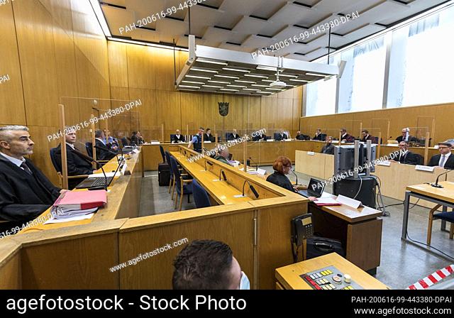 16 June 2020, Hessen, Frankfurt/Main: Stephan Ernst (2nd from left), main defendant in the Lübcke trial, sits next to his lawyer Mustafa Kaplan (left) in the...