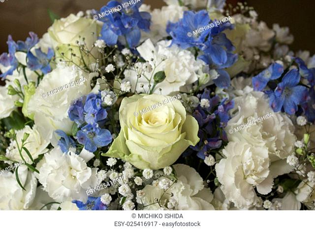 Roses, carnation, Texas bluebell & delphinium flower bouquet