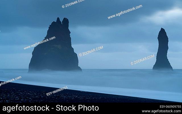 Rock spire of Reynisdrangur, coast of Reynisfjara close to Vik, Iceland, Europe