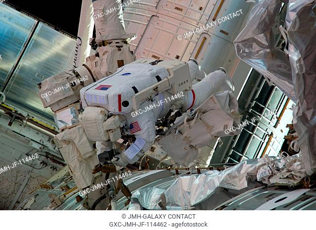 NASA astronaut Robert Behnken, STS-130 mission specialist, participates in the mission's third and final session of extravehicular activity (EVA) as...