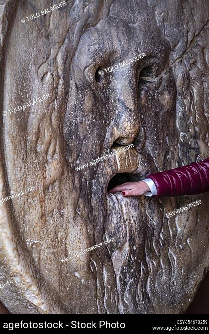 The Mouth of Truth, ancient mask of pavonazzetto marble, Saint Mary in Cosmedin, officiated by the Melkite Greek-Catholic Church, Rome, Lazio, Italy