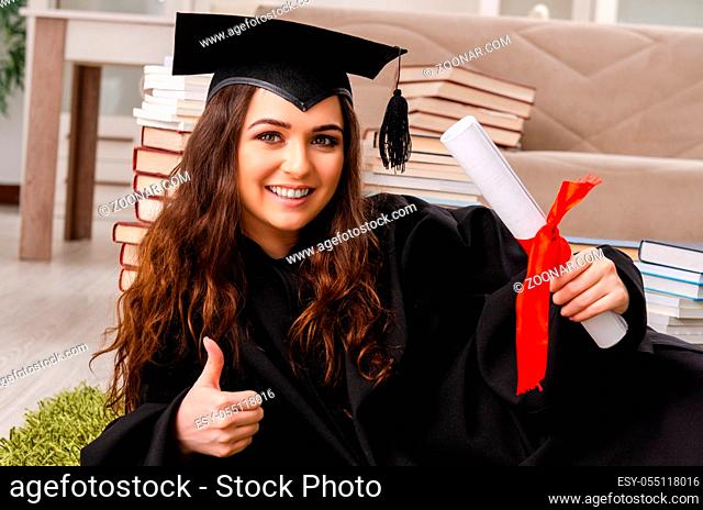 Young female student graduating from the university