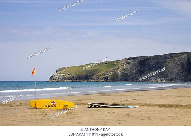 England, Cornwall, Trebarwith Strand. Lifeguards flag and surf boards on Trebarwith Strand beach