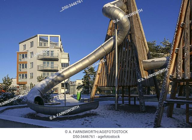 Stockholm, Sweden A playground in Liljeholmen in the snow with a big slide