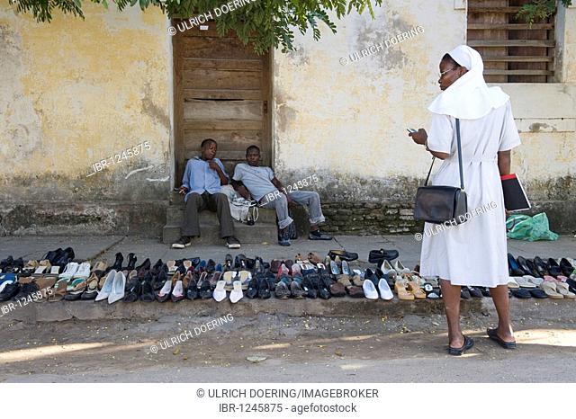 Street hawkers selling shoes, Quelimane, Mozambique, Africa