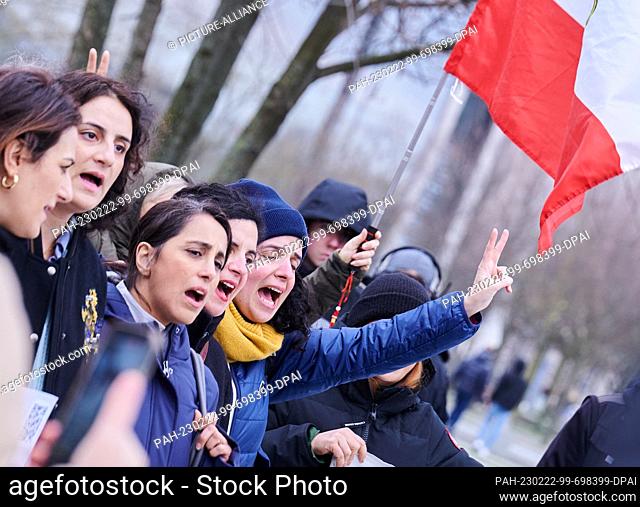22 February 2023, Berlin: ""Jin, Jiyan, Azadi (Woman, Life, Freedom)"" shout demonstrators in front of the Federal Chancellery
