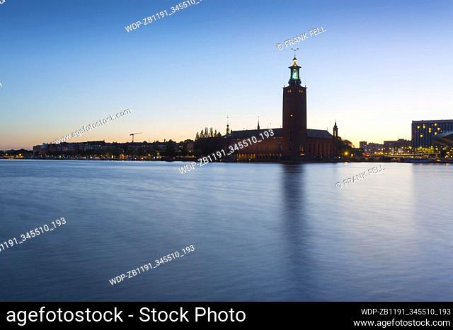 View of City Hall at dusk from Riddarholmen, Stockholm, Sweden, Scandinavia, Europe