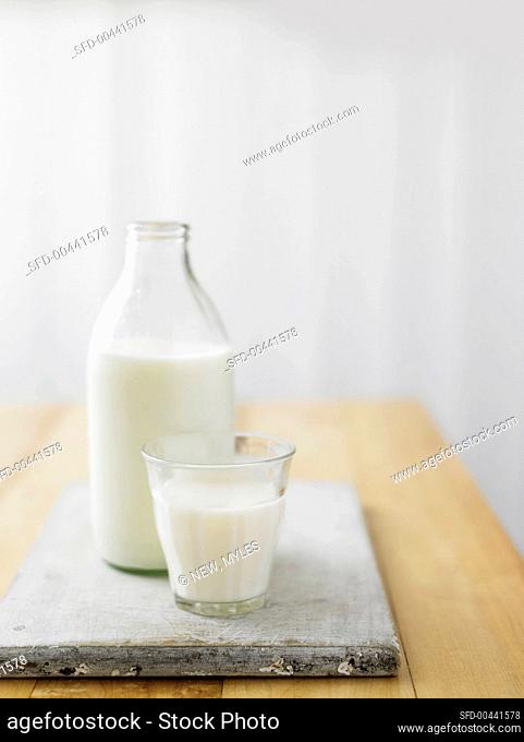 Milk bottle and glass of milk