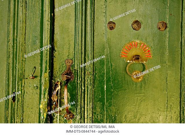 Door handle and knocker. Mikro Papingo, Ioannina, Epiros, Greece, Europe