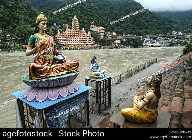 Rishikesh, India - July 2021: Views of the Swarg Niwas Temple from the Sai Ghat in Rishikesh on July 20, 2021 in Uttarakhand, India