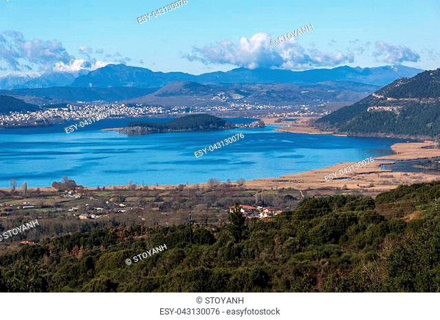 Panoramic Landscape of Lake Pamvotida, Pindus mountain and city of Ioannina, Epirus, Greece
