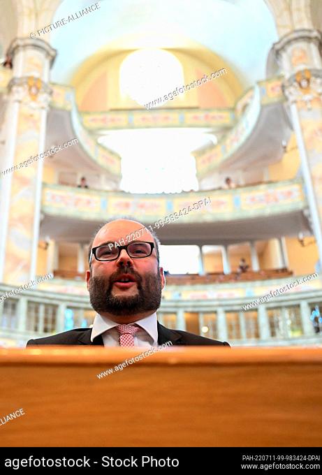 11 July 2022, Saxony, Dresden: Christian Piwarz (CDU), Saxony's Minister of Education and Cultural Affairs, stands in the Frauenkirche before the start of the...