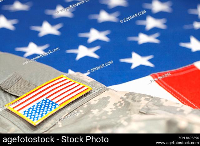 US army uniform with stripe over flag - focus on stripe