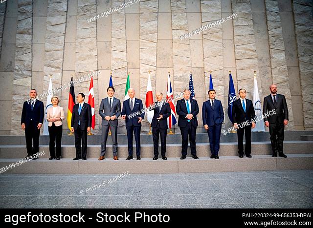 24 March 2022, Belgium, Brüssel: Jens Stoltenberg (l-r), NATO Secretary General, stands for the family photo next to Ursula von der Leyen