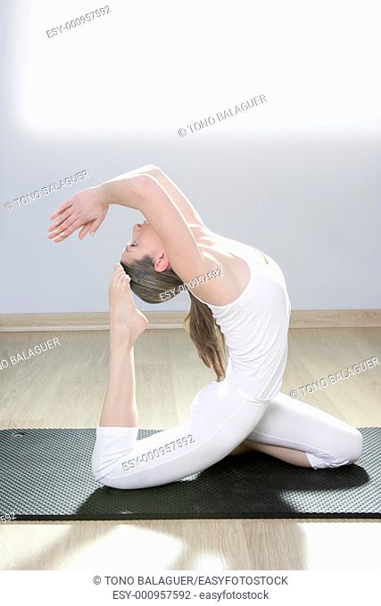 yoga woman fitness girl in white meditation at gym on mat