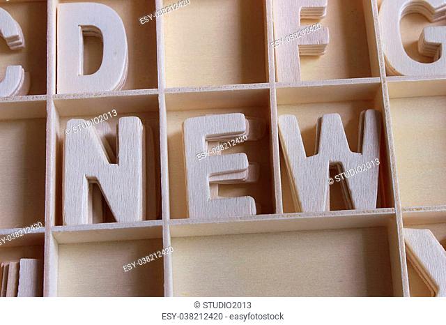 Word new made with wooden letters alphabet