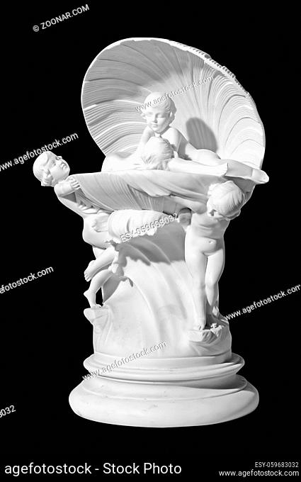 Classical marble statuette with antique scene on a black background