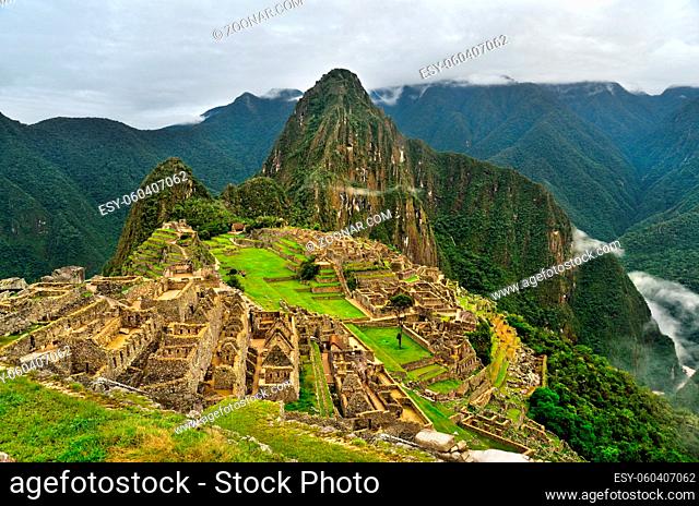 View of the Machu Picchu Inca citadel with Huayna Picchu at the background. UNESCO World Heritage Site. Cusco Region, Peru