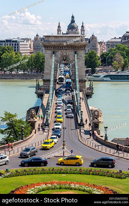 Budapest, Hungary - July 10, 2019: View at Budapest skyline with St. Stephen Basilica building and chain bridge over Danube river