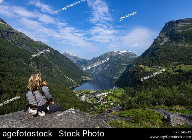 Mother with child overlooking Geirangerfjord, Sunmore, Norway, Europe