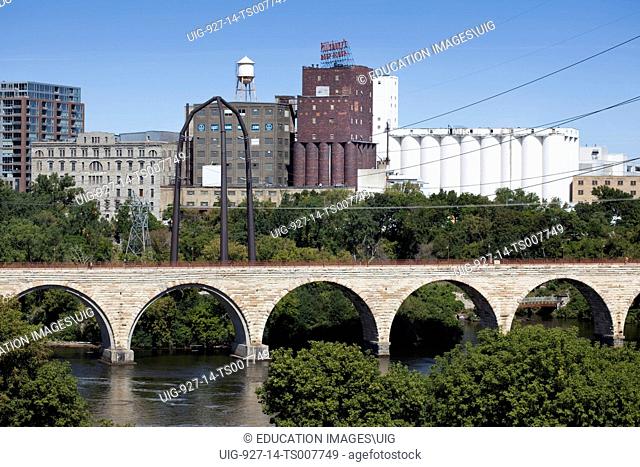 The Stone Arch Bridge and Pillsbury Milling complex along the Mississippi River