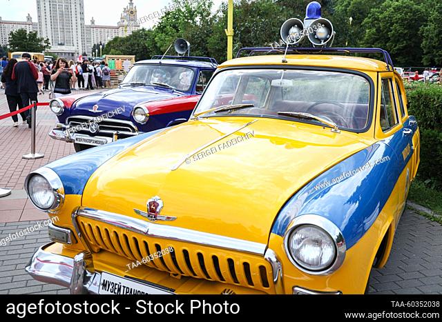RUSSIA, MOSCOW - JULY 9, 2023: A GAZ-21 Volga retro police car is on display during a vintage vehicle festival marking Moscow Public Transport Day on Sparrow...