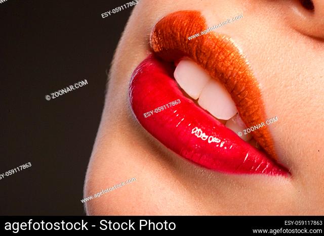 two colors lipstick closeup on woman