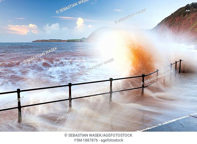 Waves crashing against walkway in Sidmouth, Devon, England, United Kingdom, Europe