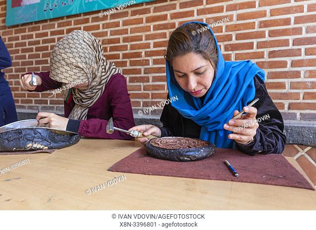 Girls working with traditional metal chasing, Sheikh Safi-ad-din Ardabili complex, Ardabil, Ardabil Province, Iran
