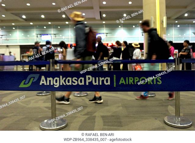 BALI - JULY 22 2019:Air passengers at Ngurah Rai International Airport Bali Indonesia, world's third best airport (with 15-25 million passengers each year)