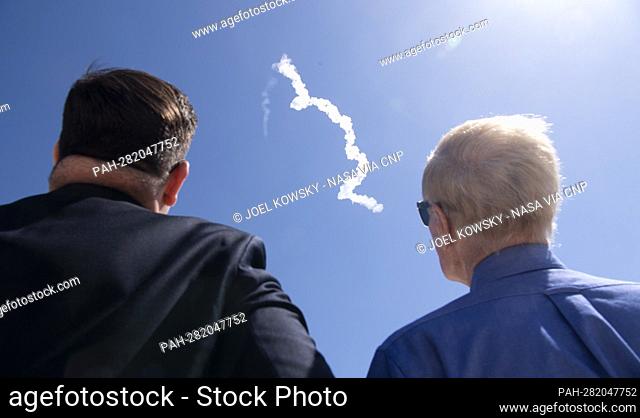 NASA Deputy Chief of Staff Bale Dalton, left, and NASA Administrator Bill Nelson watch the launch of a SpaceX Falcon 9 rocket carrying the company's Crew Dragon...