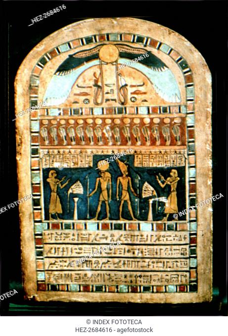 Stela in wood representing the deceased Ba-s-Turefi before the god Atum and Ra-Haharchte, from Th?