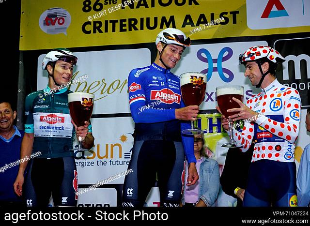 Belgian Jasper Philipsen of Alpecin-Deceuninck, Dutch Mathieu van der Poel of Alpecin-Deceuninck and Italian Giulio Ciccone of Lidl-Trek celebrate on the podium...