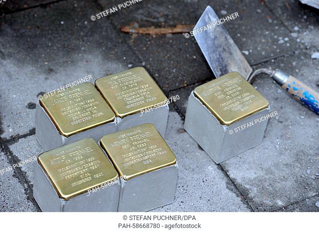 'Stolpersteine' (stumbling blocks) are laid into the sidewalk on a street in Ulm,  Germany, 26 May 2015. The blocks recall the former Jewish residents who were...