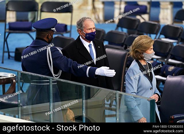 ((Sent direct from camera please tone and crop)) NYTINAUG - Former President George W. Bush and Laura Bush. The inauguration ceremony for President Joe Biden...
