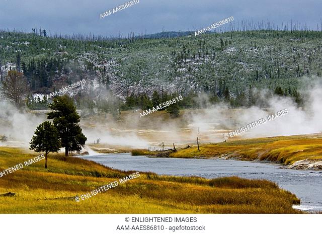 Geothermal steam rising above the Firehole River near midway Geyser Basin, Yellowstone National Park, Wyoming