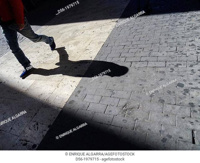 Pedestrian shadow, Valencia, Spain