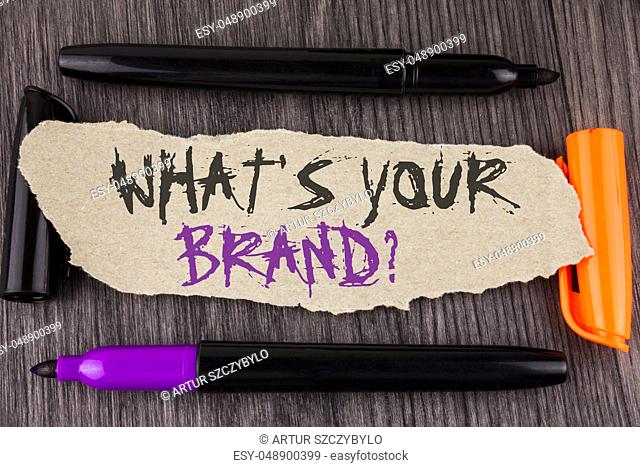 Text sign showing What is Your Brand Question. Conceptual photo asking about your company manufacturer or model written Tear Cardboard Paper the wooden...