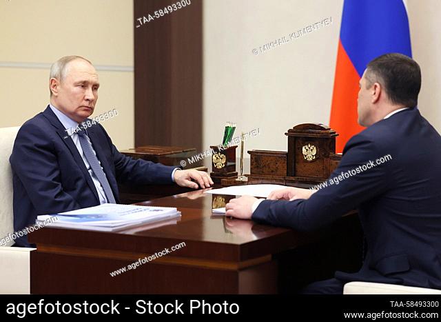 RUSSIA, MOSCOW REGION - APRIL 18, 2023: Russia's President Vladimir Putin (L) receives Pskov Region Governor Mikhail Vedernikov at his Novo-Ogaryovo residence
