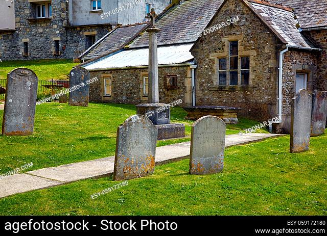 The churchyard of parish church of St Michael the Archangel, above Church Cliff. Lyme Regis. West Dorset. England