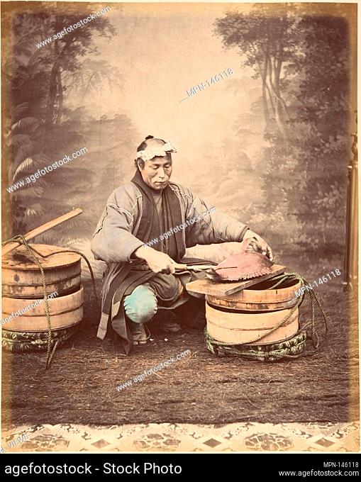 [Japanese Man Preparing a Fish]. Artist: Suzuki Shin'ichi (Japanese, 1835-1919); Date: 1870s; Medium: Albumen silver print from glass negative; Dimensions: 25