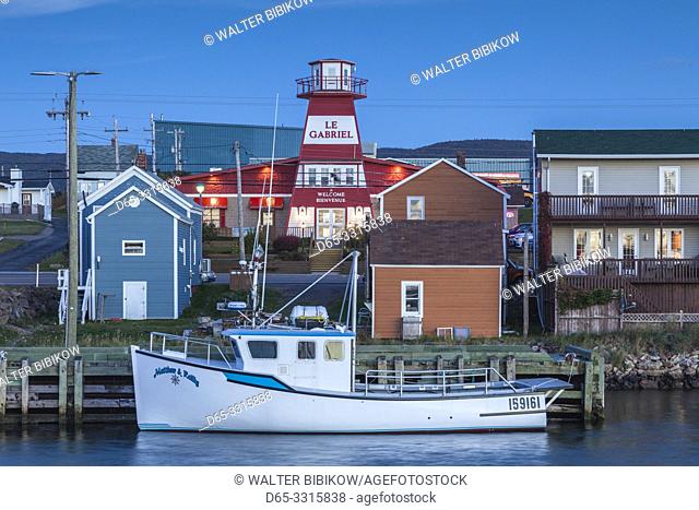 Canada, Nova Scotia, Cabot Trail, Cheticamp, town harbor with town view, dusk