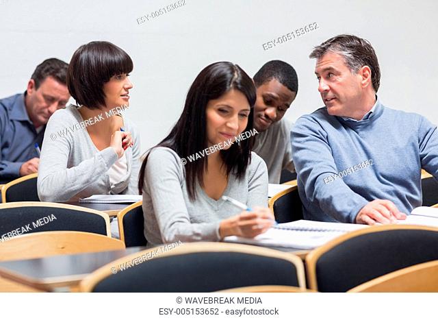Students talking in lecture