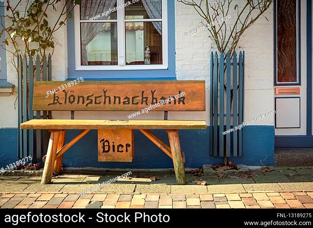 Wooden bench in front of a house, Friedrichstadt, Schleswig-Holstein, Germany, Europe