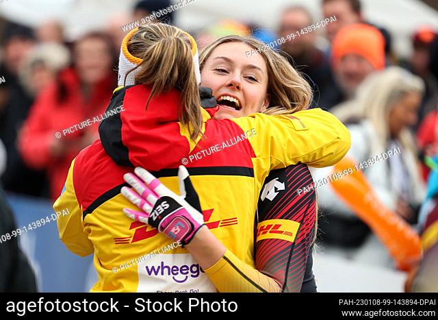 08 January 2023, North Rhine-Westphalia, Winterberg: Bobsleigh: World Cup, two-man bobsleigh, women, 2nd run: Laura Nolte (r) from Germany is happy after her...