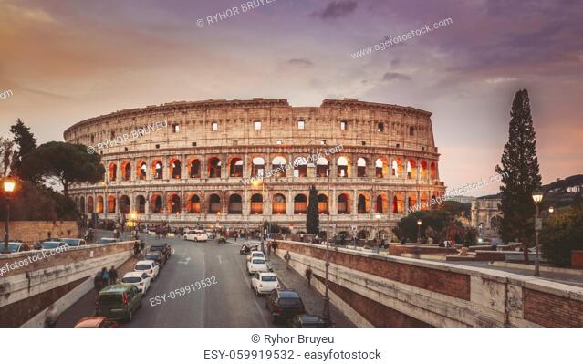 Rome, Italy. Colorful Sunset Dawn Sky Above Colosseum Also Known As Flavian Amphitheatre In Evening Time