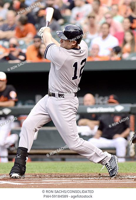 New York Yankees third baseman Chase Headley (12) bats in the first inning against the Baltimore Orioles at Oriole Park at Camden Yards in Baltimore