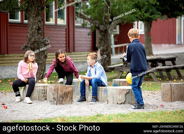 Children talking on playground