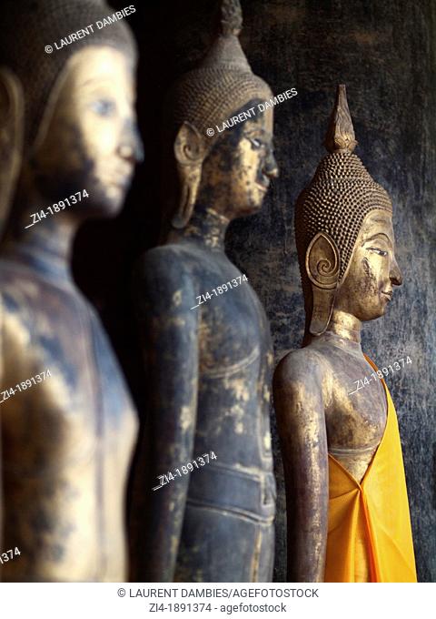Buddha statues inside Vat Visounnarath in Luang Prabang Laos